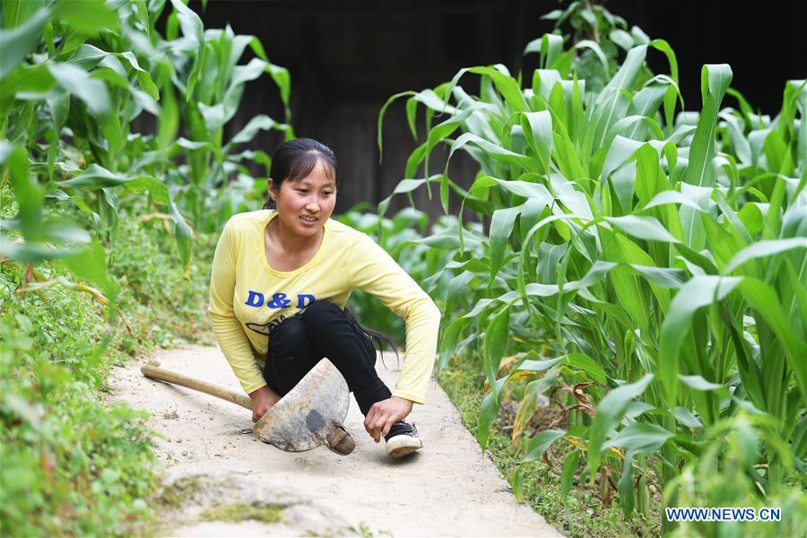 CHINA-CHONGQING-DISABLED FEMALE FARMER (CN)