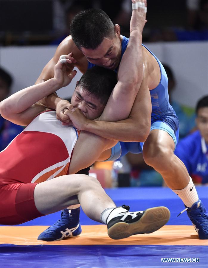 (SP)INDONESIA-JAKARTA-ASIAN GAMES-WRESTLING-MEN'S FREESTYLE 57 KG